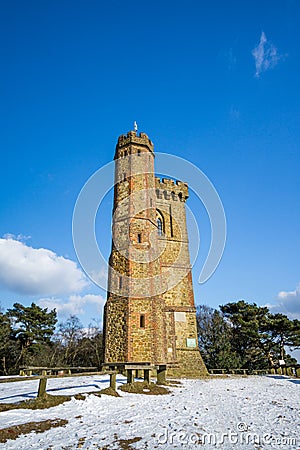 Leith Hill, Surrey, UK - 28th February 2018: A view of Leith Hill Tower on a cold winter`s day with snow on the ground Editorial Stock Photo