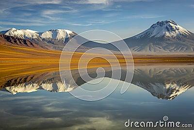 Lejia lake reflection at sunrise, near Atacama Volcanoes, Chile Stock Photo