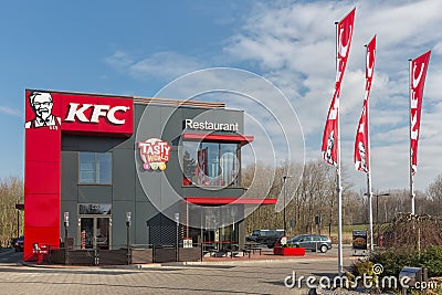 Car park near Dutch motorway with KFC fastfood restaurant Editorial Stock Photo