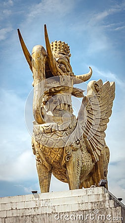 Statue of Lembuswana in Pulau Kumala, Mythology animal from Indonesia, with blue sky as the background Stock Photo