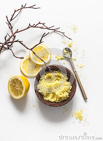 Lemon, coffee anti-cellulite scrub with natural ingredients, sea salt on a light background, top view. Skin care concept Stock Photo