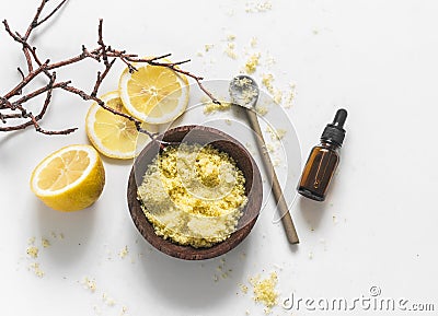 Lemon, coffee anti-cellulite scrub with natural ingredients, sea salt on a light background, top view. Skin care concept Stock Photo