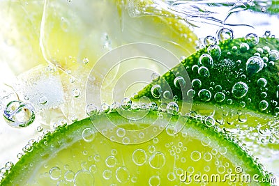 Lemon drop in fizzy sparkling water, juice Stock Photo