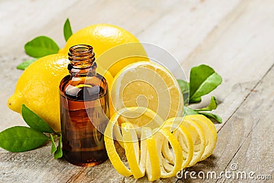 Lemon essential oil and lemon fruit Stock Photo