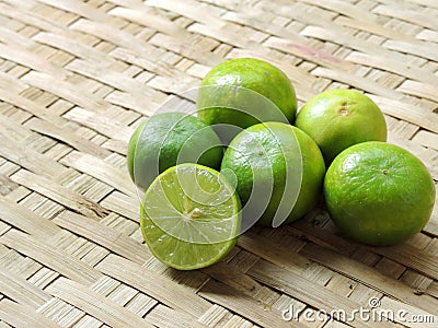 Lemon/Lime in the threshing basket texture Stock Photo