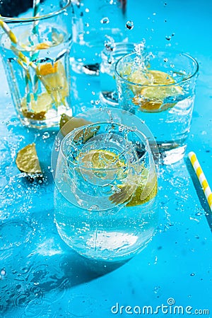 Lemon and lime water in various glasses, summer drink concept Stock Photo