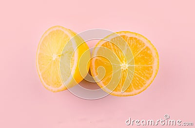 Lemon photo, Ripe half of yellow lemon citrus fruit isolated on PINK background with clipping path Stock Photo