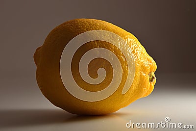 Lemon piece on white base gray isolated background Stock Photo