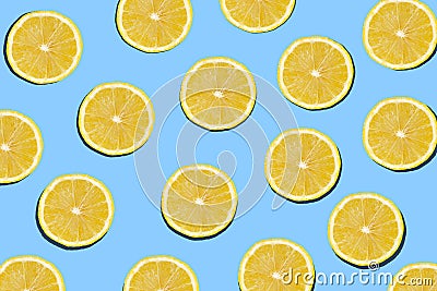 lemon slices on a blue background, tropical summer poster Stock Photo