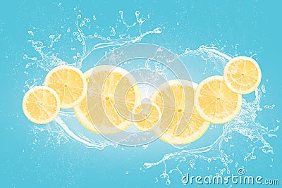Lemon slices with water splash isolated on blue blackground Stock Photo