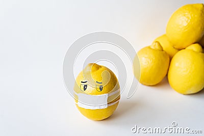 Lemon wearing medical mask isolated from the crowd. Conceptual image of social distancing Stock Photo