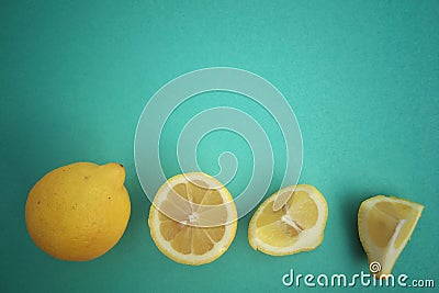 Lemon, whole and cut in piece Stock Photo