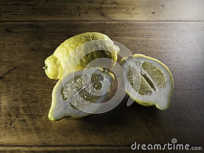 Lemon On Wooden Table Stock Photo