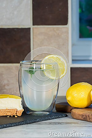 Lemons. Lemon cheescake and authentic home-made lemonade with lemons and mint Stock Photo