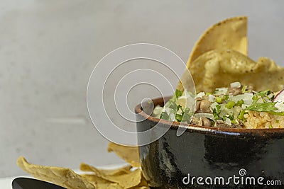 lemons for meat dish in its juice with corn tortilla chips, glass with horchata water, mexican food Stock Photo
