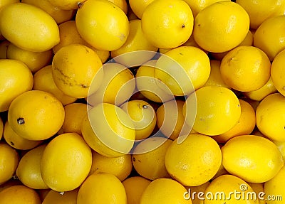 Lemons top view, yellow smooth lemons, box with lemons Stock Photo