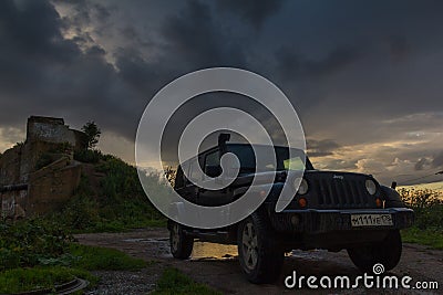 Leningrad region, Russia , July 12, 2016 , Jeep Wrangler on the first North Fort in Kronstadt, the Jeep Wrangler is a compact four Editorial Stock Photo