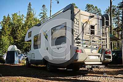 Leningrad Region, Russia - June 2022. Stylish white modern mobile home based on Ford Transit, rear view. The bus for Editorial Stock Photo