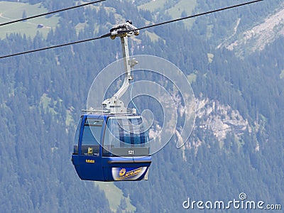 Lenk im Simmental, Switzerland - July 12, 2015: Ski lift in moun Editorial Stock Photo