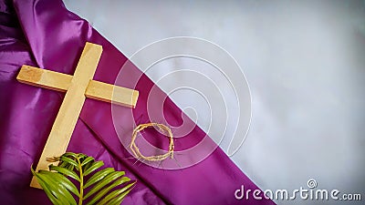 Lent Season,Holy Week and Good Friday concepts - image of wooden cross,crown of thorns and palm leave in vintage background Stock Photo