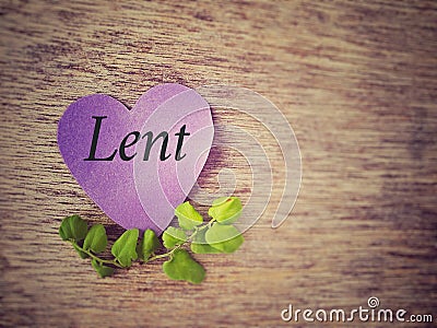 Lent Season, Holy Week and Good Friday concepts - Lent text on purple heart shape paper with flora background. Stock photo. Stock Photo