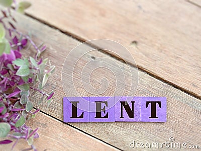 Lent Season,Holy Week and Good Friday concepts - word lent on purple wooden blocks in vintage background. Stock photo. Stock Photo