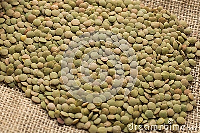 Lentils on jute as background Stock Photo