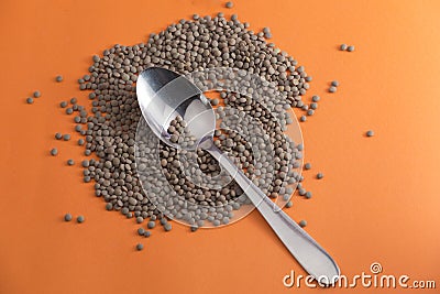 Lentils, spoon plate Stock Photo