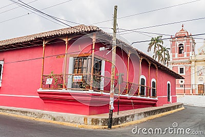 LEON, NICARAGUA - APRIL 25, 2016: View of a colorful colonial house of Antiguo Orfanato Old orphanage in Leon, Nicaragua Editorial Stock Photo