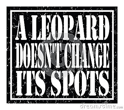 A LEOPARD DOESN`T CHANGE ITS SPOTS, text written on black stamp sign Stock Photo