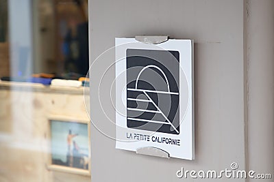 La Petite Californie text sign store and logo brand on facade windows shop Editorial Stock Photo