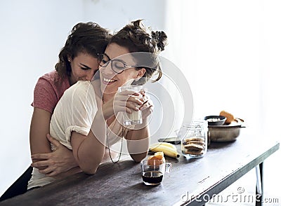 Lesbian Couple Together Indoors Concept Stock Photo