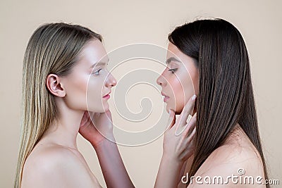 Lesbian tolerant LGBT couple woman friendly relationships. Girlfriends kiss. Stock Photo