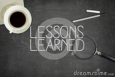 Lessons learned concept on black blackboard Stock Photo
