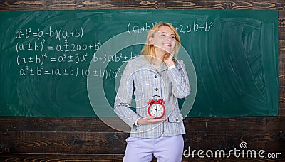 Lessons schedule. Welcome teacher school year. Experienced educator start lesson. She cares about discipline. Woman Stock Photo