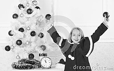 Let kid decorate christmas tree. Favorite part decorating. Getting child involved decorating. How to decorate christmas Stock Photo