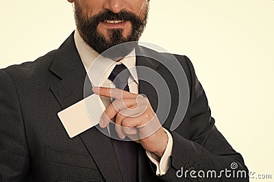 Let me introduce myself. Feel free to contact me. Businessman smiling hold plastic blank white card. Businessman carries Stock Photo