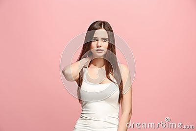 Let me think. Doubtful pensive woman with thoughtful expression making choice against pink background Stock Photo