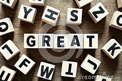 Letter block in word great with another on wood background Stock Photo