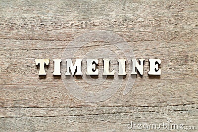 Letter block in word timeline on wood background Stock Photo