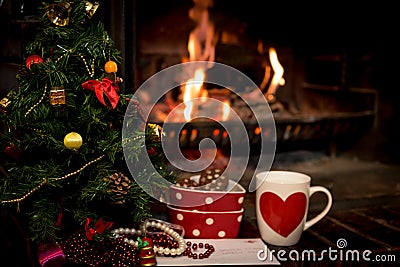 Letter, cookies and milk for Santa Claus below Christmas tree Stock Photo