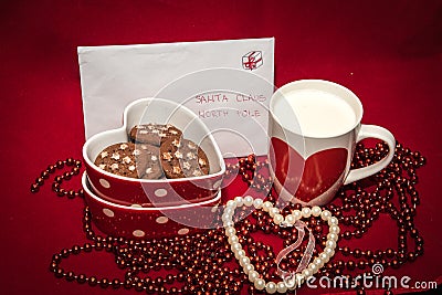 Letter, cookies and milk for Santa Claus decoration Stock Photo