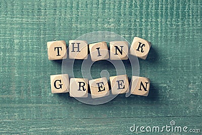 Letter cubes with word think green Stock Photo