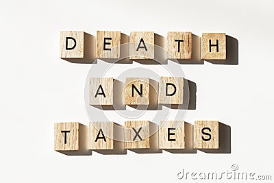 Letter tiles spelling Death and Taxes Stock Photo