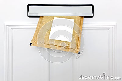 Letterbox and padded envelope Stock Photo