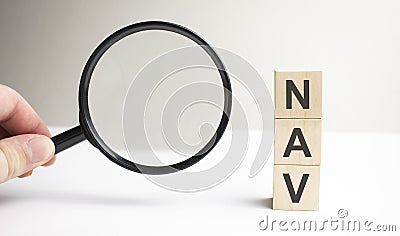 Lettering nav on wooden cubes on a gray background Stock Photo