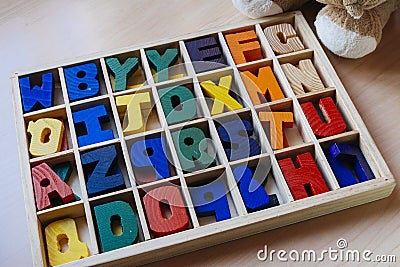 Letters to learn to write and read in your wooden box Stock Photo