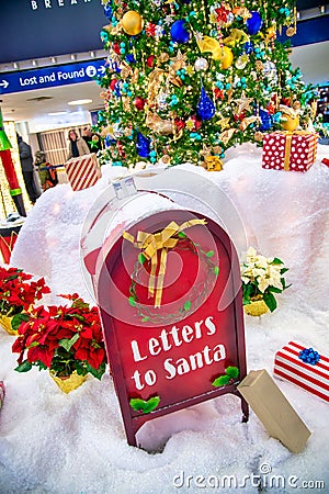 Letters to Santa box in the snow. Christmas concept Editorial Stock Photo