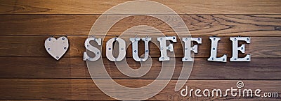Letters on the wall. Interior decoration of letter written as souffle in capital letters. Long banner for website Stock Photo