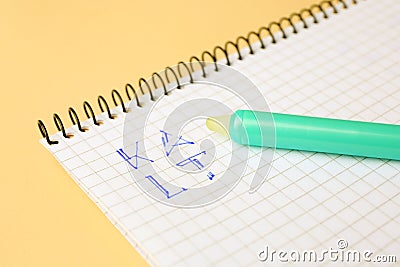 Letters written in notepad with erasable pen on beige background, closeup Stock Photo